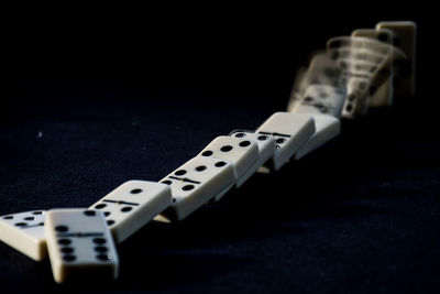 Close-up of piano on table