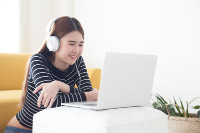 Young woman using mobile phone