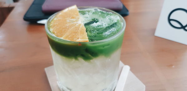 High angle view of drink in glass on table