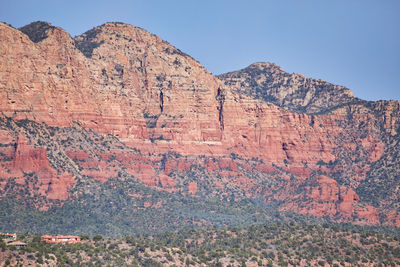 Scenic view of rocky mountains against clear sky