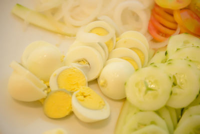 Close-up of yellow eggs in plate