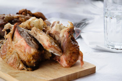 Close-up of meat on cutting board