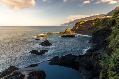 Scenic view of sea against sky during sunset