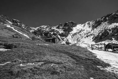 Scenic view of snowcapped mountains against sky