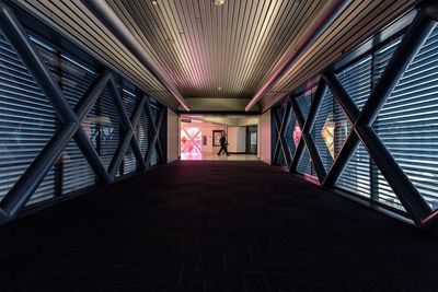 Illuminated walkway at airport