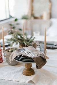 Beautiful table setting for christmas dinner in scandinavian style