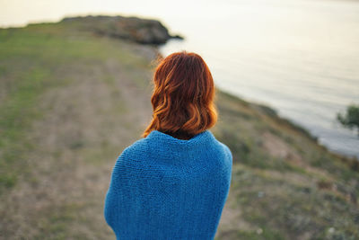 Rear view of woman looking away