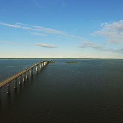 Scenic view of sea against blue sky