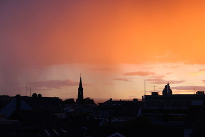 Silhouette of buildings at sunset