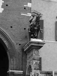 Low angle view of statue outside building