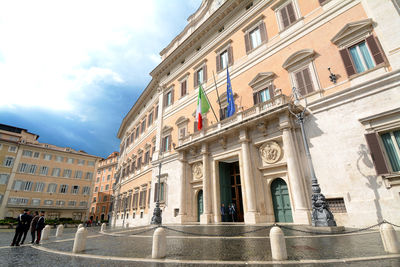 Low angle view of buildings against sky