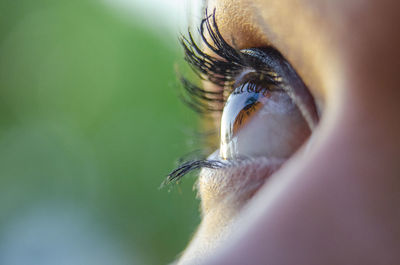 Macro shot of woman looking up