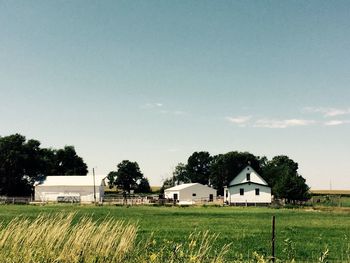 House on field against sky