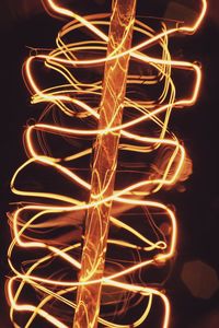 Close-up of light painting against black background