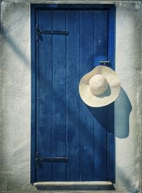 Close-up of door and hat on door