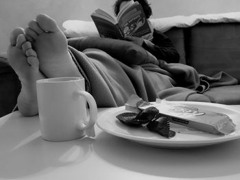 Coffee cup in front of table