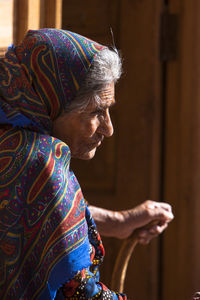 Side view of woman wearing mask