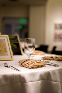 Close-up of empty glasses on table