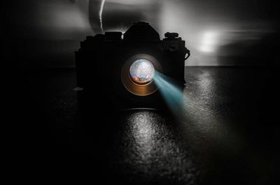 Close-up of camera on table