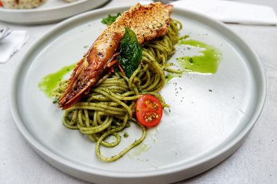 High angle view of spaghetti pasto sauce served in plate