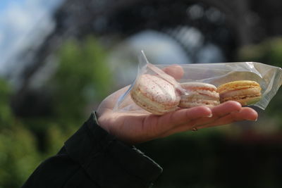 Close-up of hand holding ice cream