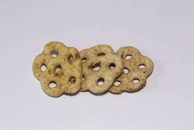 Close-up of cookies against white background