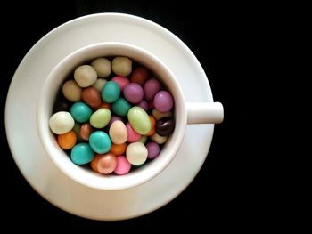 High angle view of multi colored candies in bowl