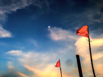 Low angle view of flag against sky