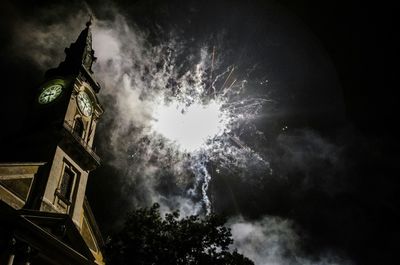 Low angle view of built structure at night