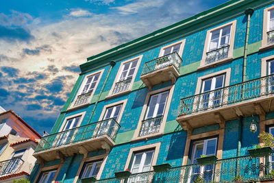 Low angle view of residential building against sky