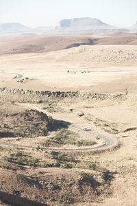 High angle view of land road against sky