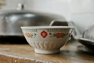 Close-up of tea cup on table