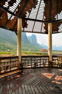 View of table and chairs against the sky