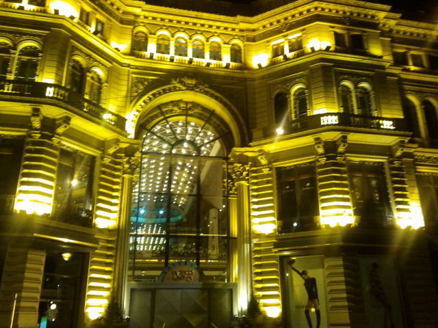 LOW ANGLE VIEW OF ILLUMINATED HISTORIC BUILDING