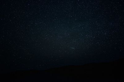 Low angle view of stars in sky at night