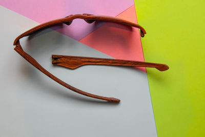 High angle view of heart shape on table against white background