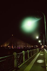 Illuminated street light at night