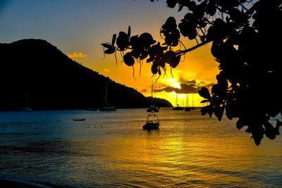 Scenic view of sea against orange sky