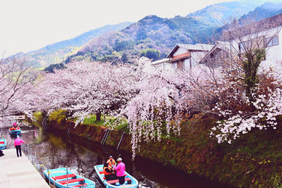 People on landscape against mountain