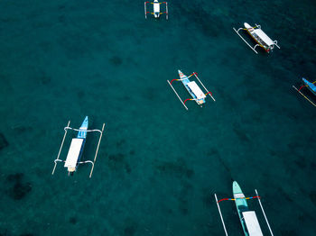 High angle view of ship sailing in sea against sky