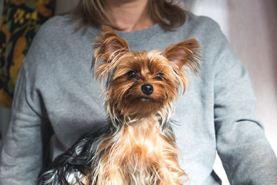 Midsection of couple with dog