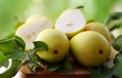 Close-up of pears on cutting board