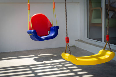 Close-up of empty swing in playground