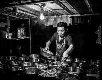 Man preparing food in kitchen