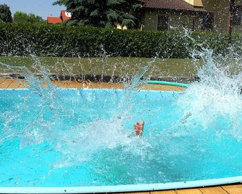 High angle view of man swimming in pool