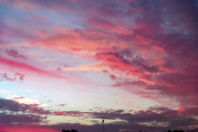 Low angle view of dramatic sky during sunset