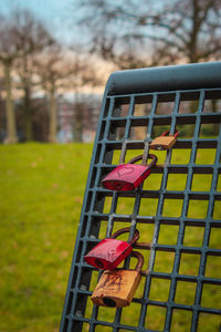 Close-up of padlocks on fence