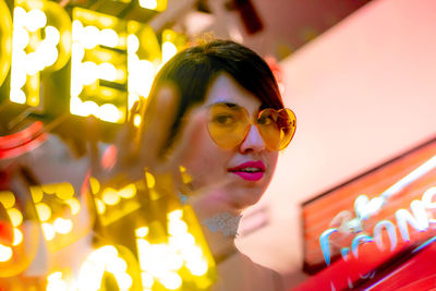 Portrait of young woman looking away