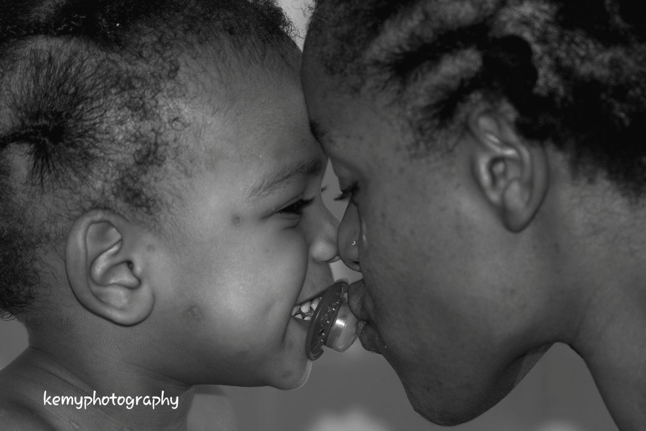 person, lifestyles, headshot, childhood, leisure activity, love, elementary age, shirtless, boys, bonding, young adult, close-up, innocence, togetherness, human face, eyes closed, front view