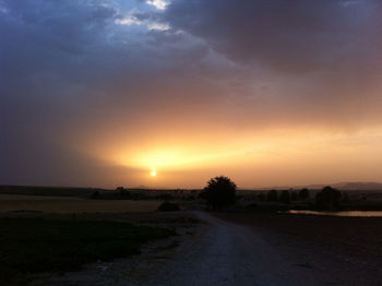 Scenic view of landscape at sunset